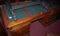 Lot 1286 - A large reproduction hardwood round cornered...
