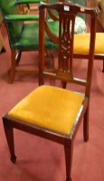 Lot 1330 - A collection of six Edwardian walnut splatback...