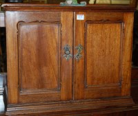 Lot 1373 - An Edwardian walnut double door table-top...