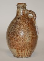 Lot 10 - A 19th century stoneware bellamine of typical...