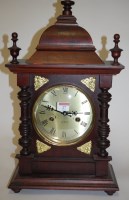 Lot 27 - A modern stained beech cased mantel clock...