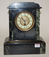 Lot 38 - A late Victorian black slate mantel clock...