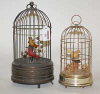 Lot 46 - A reproduction clockwork bird in cage...