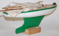 Lot 54 - A mid 20th century painted wooden pond yacht