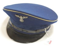 Lot 65 - A reproduction German officer's peaked cap