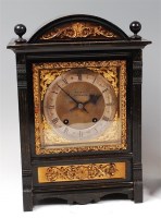 Lot 1510 - A late Victorian ebonised cased mantel clock,...