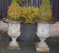 Lot 1589 - A pair of white marble pedestal campagna urns,...