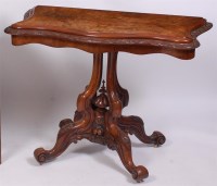 Lot 1606 - A Victorian figured walnut pedestal card table,...