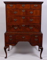 Lot 1553 - An early 18th century walnut chest-on-stand,...