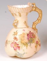 Lot 1051 - A Royal Worcester blushware jug, decorated...