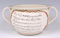 Lot 1060 - An early Victorian creamware chamberpot, the...