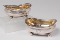 Lot 1104 - A pair of George III boat shaped table salts,...