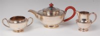 Lot 1106 - A silver three piece teaset, comprising teapot,...
