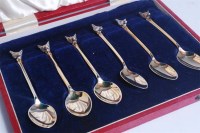 Lot 1142 - A cased set of six silver gilt teaspoons, each...
