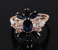 Lot 1176 - A contemporary 18ct white gold, sapphire and...