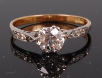 Lot 1180 - An 18ct gold diamond solitaire ring, the...