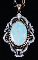 Lot 1191 - A ladies 14ct gold, opal and diamond set...