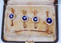 Lot 1204 - A cased set of four 15ct gold collar studs,...