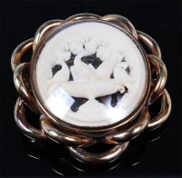 Lot 1208 - A Victorian pinchbeck and carved ivory brooch,...