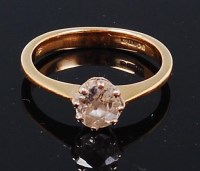 Lot 1268 - An 18ct gold and diamond solitaire ring, the...