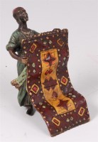 Lot 1325 - A Viennese cold painted bronze of a carpet...