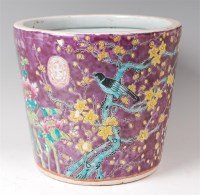 Lot 1373 - A Chinese enamel decorated stoneware...