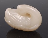 Lot 1380 - A Chinese carved celadon jade pendant as a...