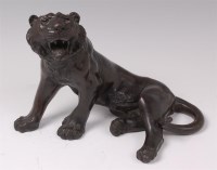 Lot 1386 - A Japanese Meiji period bronze of a tiger, in...