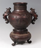 Lot 1395 - A Chinese bronze vase on stand, in the archaic...