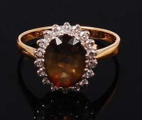 Lot 1229 - An 18ct gold, andalusite and diamond ring, the...