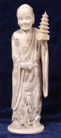 Lot 1411 - A Japanese Meiji period carved ivory okimono...