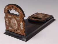 Lot 1317 - A Victorian coromandel book-slide, the hinge...