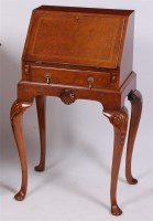 Lot 1533 - A walnut bureau de dame, in the 18th century...