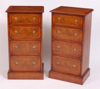 Lot 1536 - A pair of figured walnut and crossbanded four...