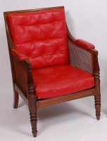 Lot 1557 - A 19th century walnut framed Bergere armchair,...