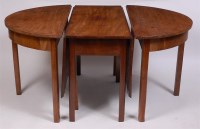 Lot 1564 - A George III mahogany double D-end dining...