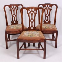 Lot 1573 - A set of three late Georgian mahogany dining...