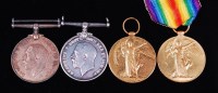 Lot 454 - A collection of four WW I medals to include...