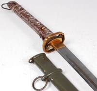 Lot 461 - A Japanese shin gunto katana, having a 67cm...