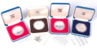 Lot 171 - Great Britain, four cased silver proof crowns,...