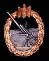 Lot 213 - A German Kriegsmarine Coastal Artillery badge,...