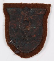 Lot 218 - A German Krim battle shield on a felt backing.