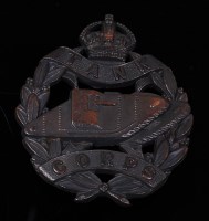 Lot 219 - A British Tank Corps bronze Officer's cap badge.