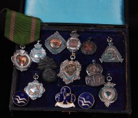 Lot 252 - A WW II silver A.R.P. badge, together with...