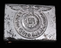 Lot 263 - A German Waffen belt buckle marked RZM 155/43...