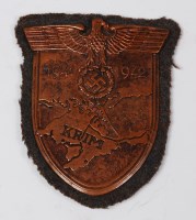 Lot 294 - A German Krim battle shield on a felt backing.