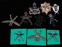 Lot 328 - A collection of assorted cap badges, cloth...