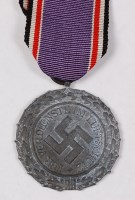 Lot 333 - A German Luftshutz Service medal.