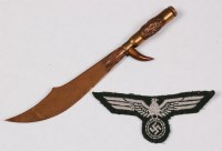 Lot 358 - A WW II German army breast eagle, together...