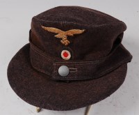 Lot 387 - A German Luftwaffe M43 field cap.